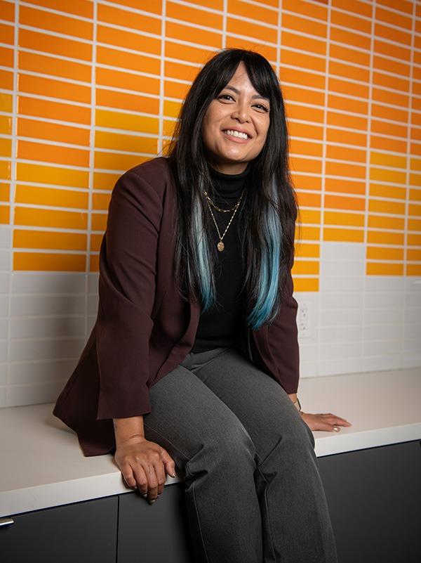 woman sitting on a countertop