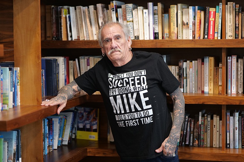 Michael Vazquez in a library