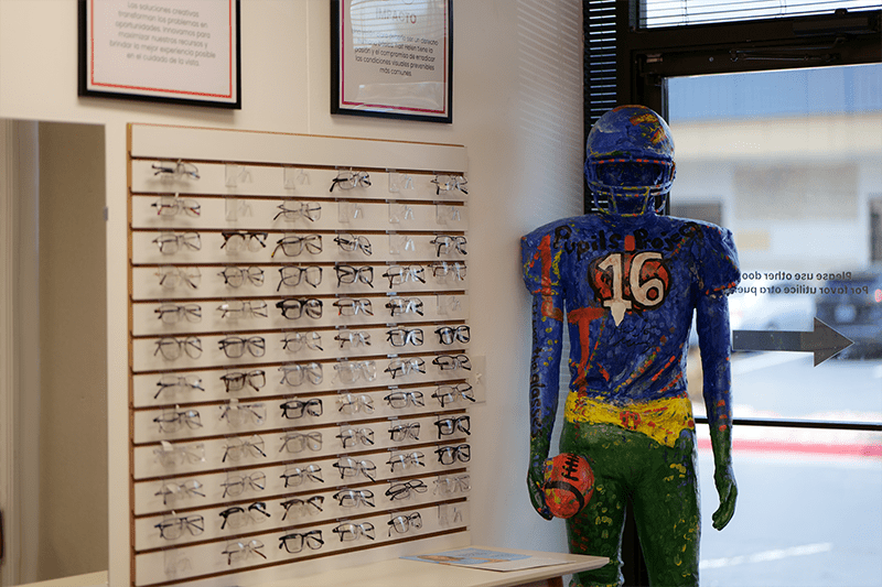 half Helen interior with paper mâché football player statue and glasses