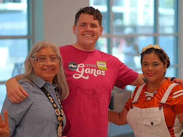 Three people posing for a picture